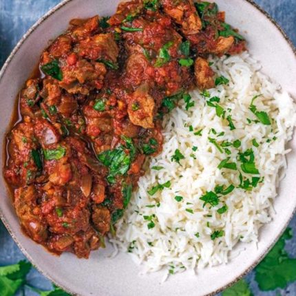 Fresh Beef meat curry over rice salad